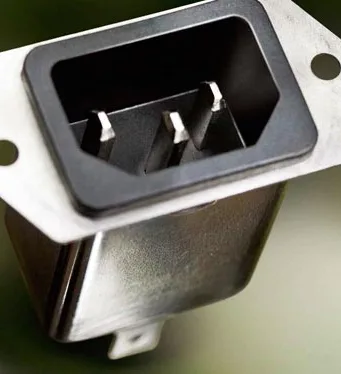 Toma con filtro para maximizar la atenuación