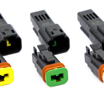 Conectores de dos posiciones para vehículos